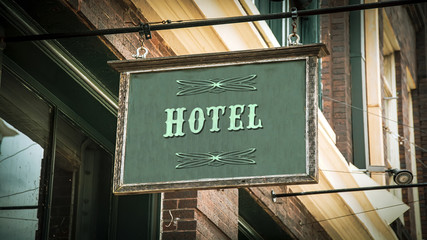 Obraz premium Street Sign to Hotel