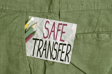 Fototapeta na wymiar Conceptual hand writing showing Safe Transfer. Concept meaning Wire Transfers electronically Not paper based Transaction Writing equipment and purple note paper inside pocket of trousers