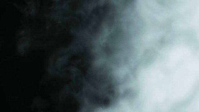 The water spray steam or smoke motion isolated on black background.