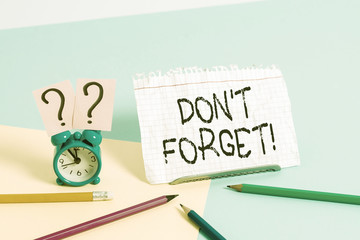 Handwriting text writing Don T Forget. Conceptual photo used to remind someone about an important...