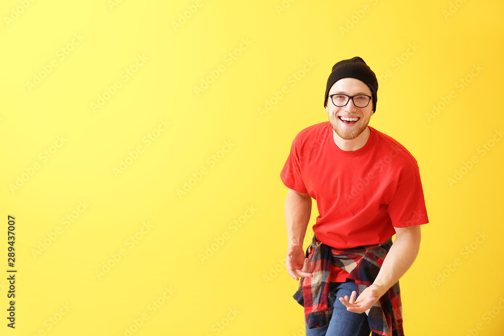 Sticker Stylish young man on color background