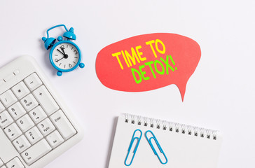Word writing text Time To Detox. Business photo showcasing when you purify your body of toxins or stop consuming drug Blank paper with copy space on the table with clock and pc keyboard
