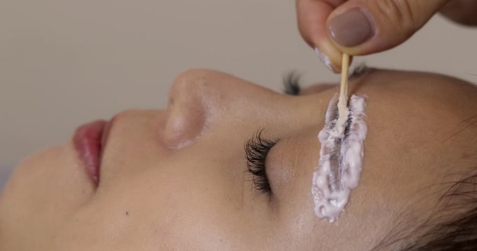 Woman having microblading in the beauty salon