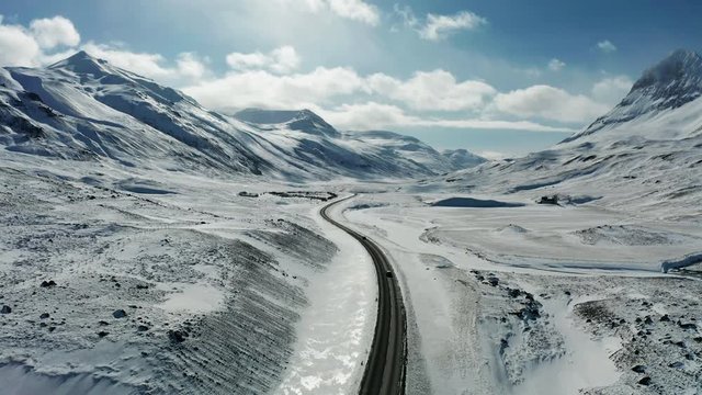 Road in the mountains in winter in Iceland. Winter road trip.