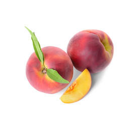 Ripe peaches on white background