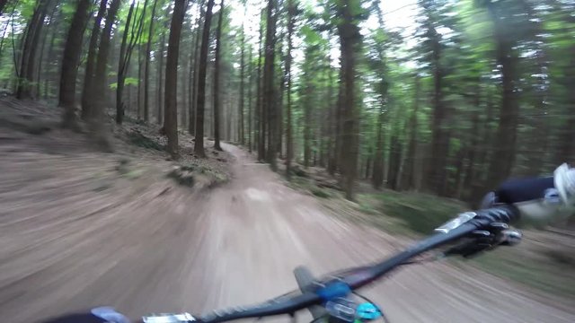 Man Riding Bike Fast On Dirt Path