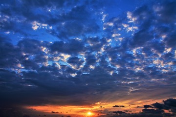Fototapeta na wymiar clouds in the shades of the sunrise