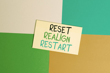 Text sign showing Reset Realign Restart. Business photo text Life audit will help you put things in perspectives Office appliance colorful square desk study supplies empty paper sticker