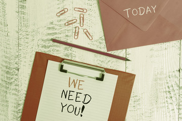 Conceptual hand writing showing We Need You. Concept meaning asking someone to work together for...