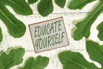 Writing note showing Educate Yourself. Business concept for prepare oneself or someone in a...