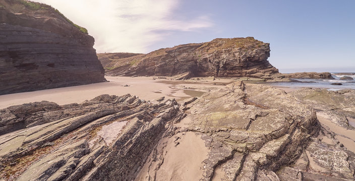 Landscape of a beach with rocky cliffs in Galicia