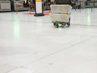 Obraz premium Airport rush. people with their suitcases walking along a corridor