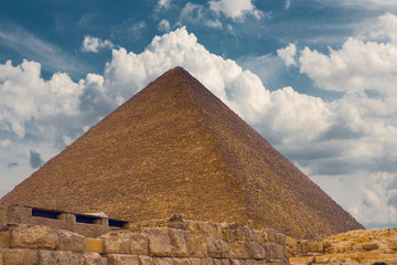 Fototapeta na wymiar Night sky of the Milky Way over the great pyramids on the plateau of Giza, Egypt, Africa. 