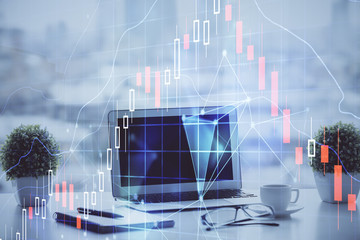 Forex Chart hologram on table with computer background. Multi exposure. Concept of financial markets.