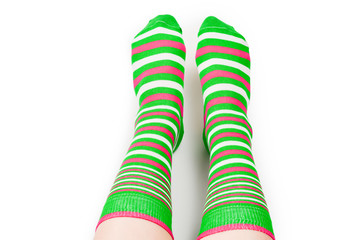 Woman in green socks isolated on white background. Top view.