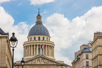 Fototapeta na wymiar The Pantheon building in the Latin Quarter in Paris France with french flags waving on the famous monument during Bastille Day