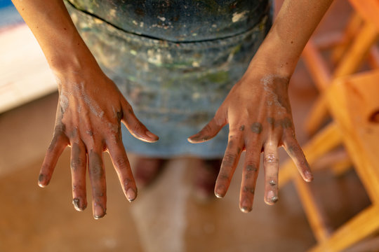Hands of female potter in a pottery studio