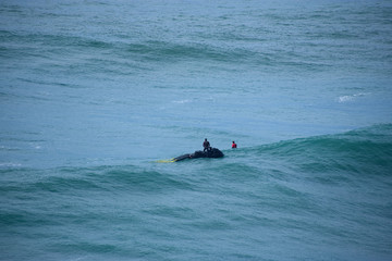 Surfing the big waves of Nazaré in Portugal