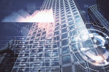 Forex chart on cityscape with tall buildings background multi exposure. Financial research concept.