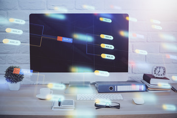 Double exposure of table with computer on background and data theme hologram. Data technology concept.