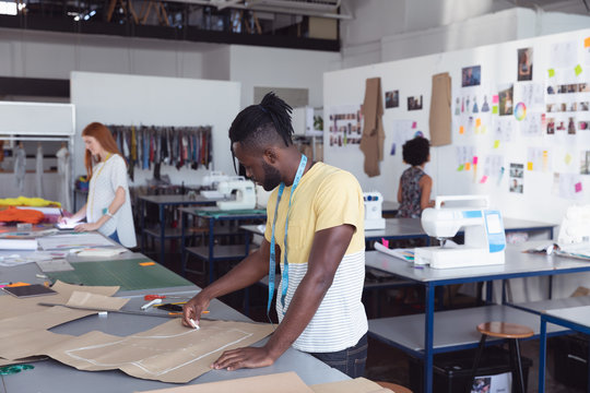 Young students working on projects at a fashion college