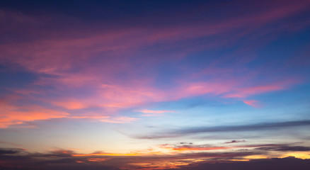 Fototapeta na wymiar Dramatic sun ray with orange sky and clouds dawn texture background