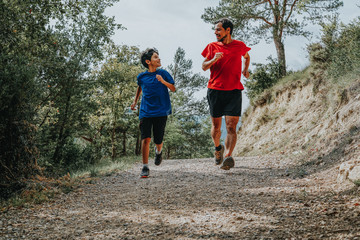 father and son running in the mountain