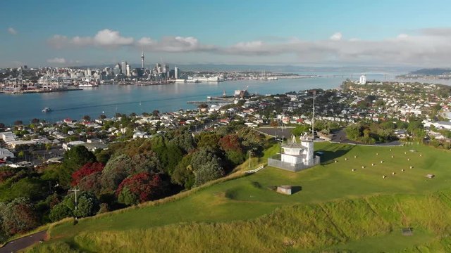 SLOWMO - Aerial shot of Mount Victoria with Auckland skyline and Sky Tower in background, New Zealand