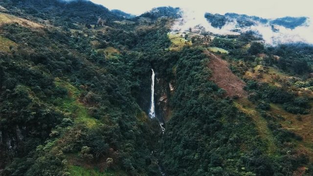 Drone Shot Of A Big Waterfall In The Middle Of Colombian Mountains. Department Of Meta. El Calvario City.