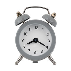 A gray clock with an alarm clock on a white background with arrows showing the time eight hours twenty minutes or twenty hours twenty minutes