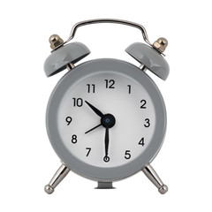 A gray clock with an alarm clock on a white background with arrows showing the time ten hours thirty minutes or twenty two hours thirty minutes