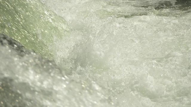 Slow motion rapids water clashing 150 fps