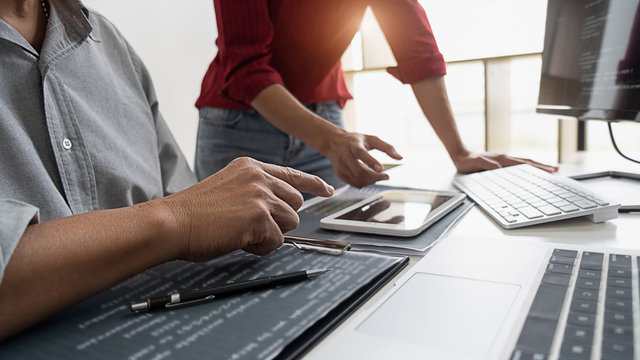Programmer working in a software development and coding technologies. Website design. Technology concept.