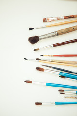 Fototapeta premium Set of paint brushes on the white background