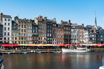 the old port and reataurant district in the historic city of Honfleur in Normandy