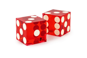 Two red professional game dice closeup isolated on a white background / three and three with a light shadow.