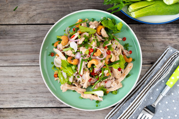 Steamed rip chicken spicy salad with shallot, celery, chili and Scallion.