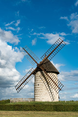 Fototapeta na wymiar vertical view of the historic windmill Moulin de Pierre in Hauville in Normandy