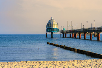 Sea pier and diving gondola in Zingst Fischland Darss Zingst, Mecklenburg Western Pomerania, with beach and Baltic Sea on a sunny morning in August