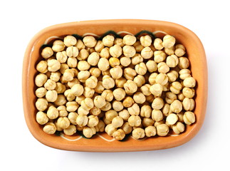 Chickpeas in clay pot, bowl isolated on white background, top view