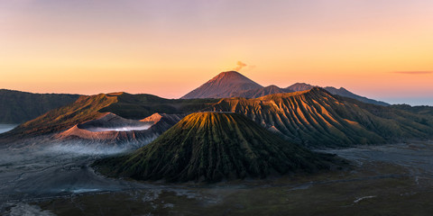Mistical view on Mount Bromo is an active volcano of Taman Nasional Bromo Tengger Semeru at golden hour (sunrise) in East Java Indonesia