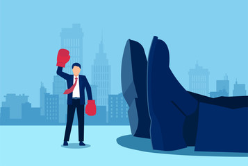 Vector of a small businessman with boxing gloves standing near a giant rival fallen down.