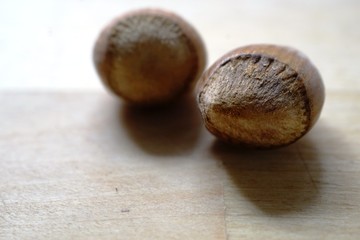 chestnuts on wooden background