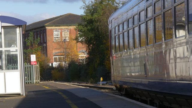 Train Arriving In Nottingham, People Arriving Home After Being Away. British Train Transport.