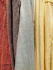 Pastel colored linen fabrics as background