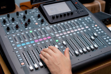 sound engineer dj. mixing console. sound recording date in the studio. audio equipment speaker amplifier