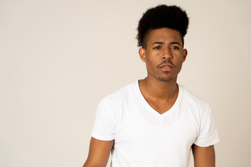 Human expressions and emotions. Young attractive man with an angry face, looking furious and crazy