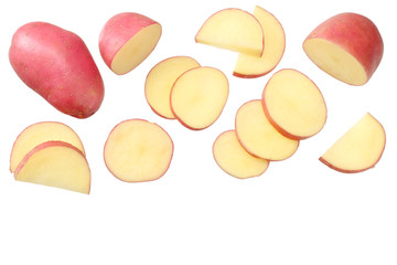Raw red potato with slices isolated on white background. top view