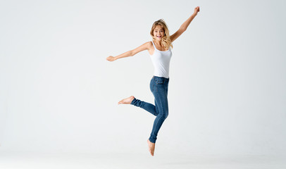 Fototapeta premium young woman jumping in the air
