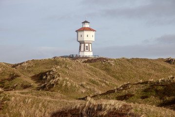 Fototapeta na wymiar The water tower - the landmark of the island Langeoog